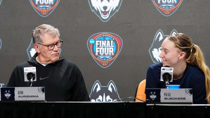 UConn Huskies coach Geno Auriemma (left) and guard Paige Bueckers during press conference at Rocket Mortgage FieldHouse.