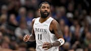 Jan 22, 2025; Dallas, Texas, USA; Dallas Mavericks guard Kyrie Irving (11) runs back up the court during the second half against the Minnesota Timberwolves at the American Airlines Center. Mandatory Credit: Jerome Miron-Imagn Images