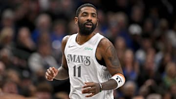 Jan 22, 2025; Dallas, Texas, USA; Dallas Mavericks guard Kyrie Irving (11) runs back up the court during the second half against the Minnesota Timberwolves at the American Airlines Center. Mandatory Credit: Jerome Miron-Imagn Images