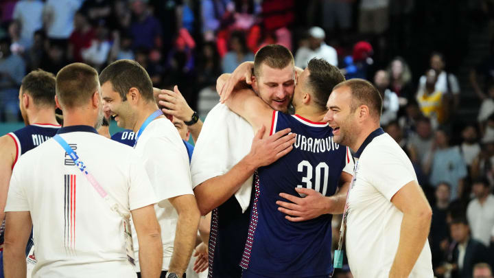 Serbia center Nikola Jokic (15) celebrates with point guard Aleksa Avramovic (30) after defeating Germany in the men's basketball bronze medal game during the Paris 2024 Olympic Summer Games at Accor Arena. 