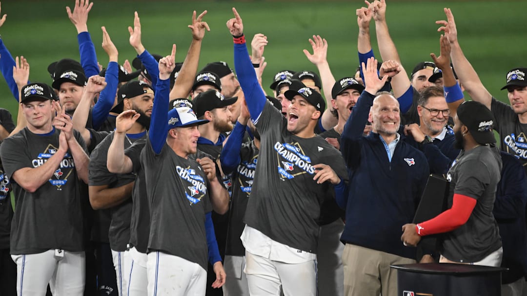 Oct 20, 2025; Toronto, Ontario, CAN; Toronto Blue Jays celebrate after winning game seven of the ALCS round for the 2025 MLB playoffs against the Seattle Mariners at Rogers Centre. Mandatory Credit: Dan Hamilton-Imagn Images