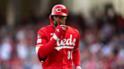 Cincinnati Reds right fielder Will Benson (30) gestures as he rounds third base for home after hitting a solo home run in the fifth inning of the MLB game between Cincinnati Reds and Cleveland Guardians at Great American Ball Park in Cincinnati on Saturday, May 17, 2025.