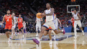 Kentucky guard Otega Oweh (00) is shown on a fast break during the first half of their second round NCAA men’ s basketball tournament game against Illinois Sunday, March 23, 2025 at Fiserv Forum in Milwaukee, Wisconsin.