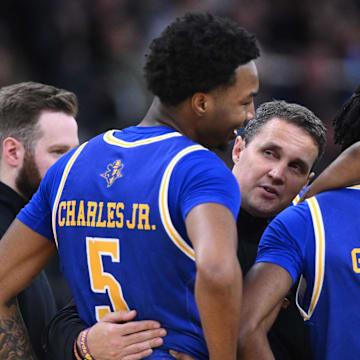 Mar 22, 2025; Providence, RI, USA; McNeese State Cowboys head coach Will Wade talks to his team during the second half of a second round men’s NCAA Tournament game against the Purdue Boilermakers at Amica Mutual Pavilion. Mandatory Credit: Brian Fluharty-Imagn Images