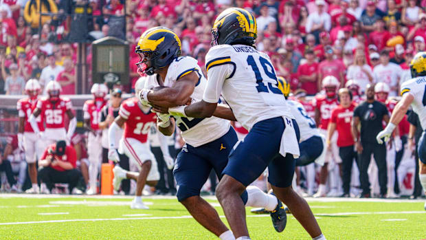 Michigan quarterback Bryce Underwood (19) and running back Justice Haynes scored on long touchdown runs vs. Nebraska.