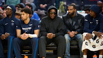 Dec 12, 2025; San Francisco, California, USA; Minnesota Timberwolves guard Anthony Edwards (5) watches the game in street clothes on the bench during the second quarter of the game against the Golden State Warriors at Chase Center. Mandatory Credit: Robert Edwards-Imagn Images