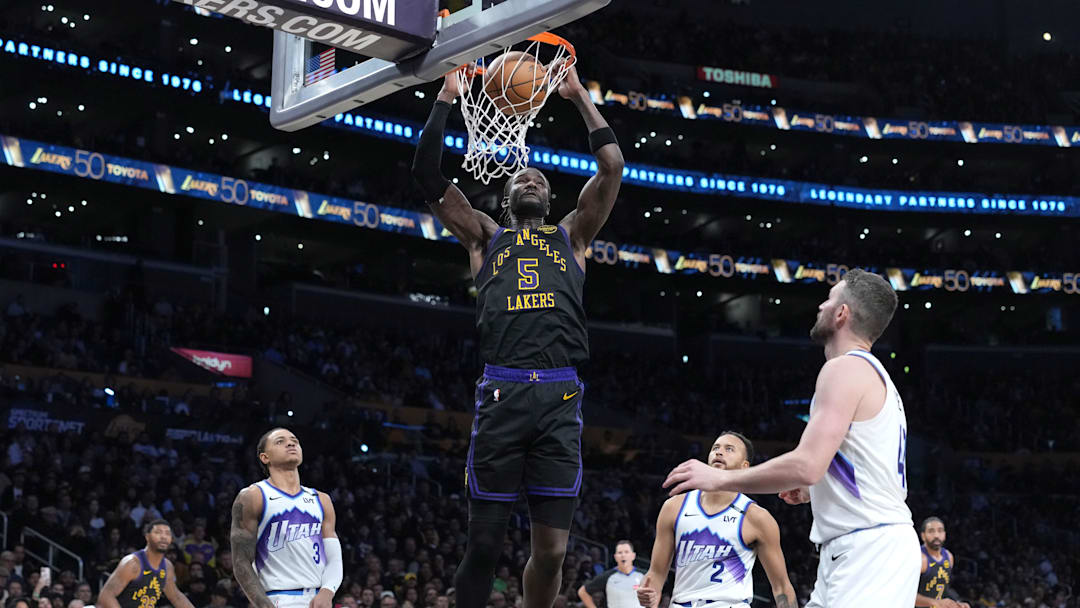 Nov 18, 2025; Los Angeles, California, USA: Los Angeles Lakers center Deandre Ayton (5) dunks the ball against the Utah Jazz in the second quarter at Crypto.com Arena. Mandatory Credit: Kirby Lee-Imagn Images