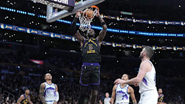 Nov 18, 2025; Los Angeles, California, USA: Los Angeles Lakers center Deandre Ayton (5) dunks the ball against the Utah Jazz in the second quarter at Crypto.com Arena. Mandatory Credit: Kirby Lee-Imagn Images