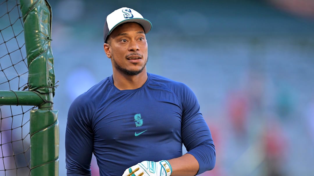 Jul 24, 2025; Anaheim, California, USA;  Seattle Mariners second baseman Jorge Polanco (7) warms up prior to the game against the Los Angeles Angels at Angel Stadium. Mandatory Credit: Jayne Kamin-Oncea-Imagn Images