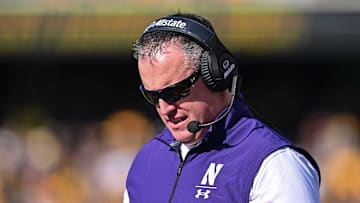 Oct 29, 2022; Iowa City, Iowa, USA; Northwestern Wildcats head coach Pat Fitzgerald looks on during the game against the Iowa Hawkeyes at Kinnick Stadium. Mandatory Credit: Jeffrey Becker-Imagn Images