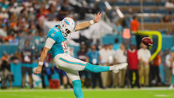 Sep 30, 2024; Miami Gardens, Florida, USA; Miami Dolphins punter Jake Bailey (16) punts against the Tennessee Titans during the third quarter at Hard Rock Stadium. 