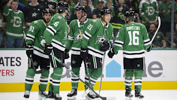 Oct 3, 2023; Dallas, Texas, USA; Dallas Stars defenseman Lian Bichsel (6) and left wing Jason Robertson (21) and center Joe Pavelski (16) and center Tyler Seguin (91) and defenseman Thomas Harley (55) celebrates a goal scored by Robertson against the Colorado Avalanche during the second period at the American Airlines Center. Mandatory Credit: Jerome Miron-Imagn Images