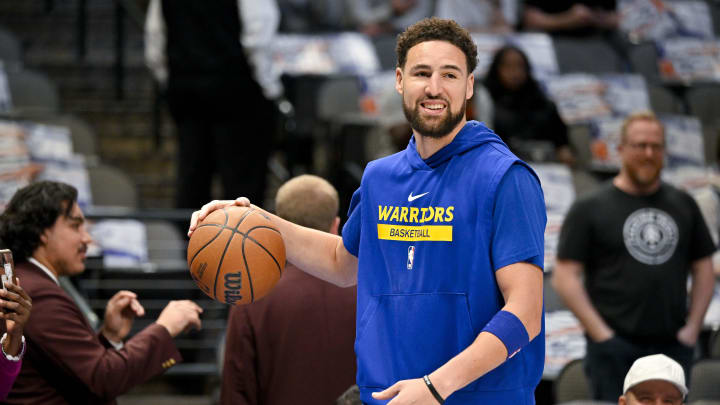 Mar 22, 2023; Dallas, Texas, USA; Golden State Warriors guard Klay Thompson (11) warms up before the game between the Dallas Mavericks and the Golden State Warriors at the American Airlines Center. Mandatory Credit: Jerome Miron-USA TODAY Sports