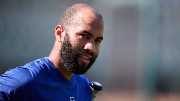 Aug 3, 2024; Oakland, California, USA; Los Angeles Dodgers outfielder Amed Rosario (27) warms up on the field before the game against the Oakland Athletics at Oakland-Alameda County Coliseum. Mandatory Credit: Robert Edwards-USA TODAY Sports