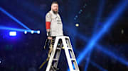 Kevin Owens enters the arena during the WWE Undisputed Championship match during the WWE Royal Rumble at Lucas Oil Stadium. 