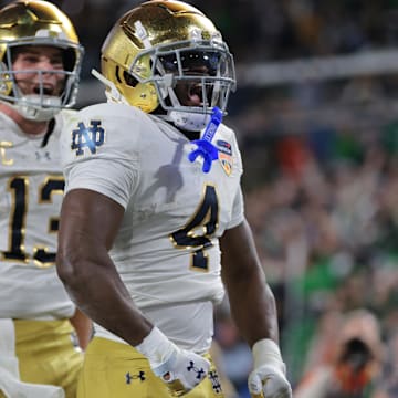 Notre Dame running back Jeremiyah Love celebrates his touchdown in the national title game last season.