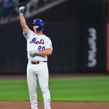 Aug 28, 2025; New York City, New York, USA; New York Mets first baseman Pete Alonso (20) reacts after hitting a double against the Miami Marlins during the first inning at Citi Field. Mandatory Credit: John Jones-Imagn Images