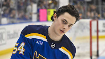 Mar 23, 2025; St. Louis, Missouri, USA;  St. Louis Blues center Dalibor Dvorsky (54) skates during his rookie lap before his first NHL game against the Nashville Predators at Enterprise Center. Mandatory Credit: Jeff Curry-Imagn Images