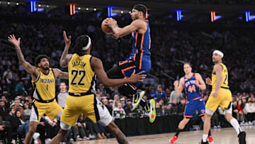 Feb 10, 2024; New York, New York, USA; New York Knicks guard Josh Hart (3) looks to pass the ball as Indiana Pacers forward Obi Toppin (1) and Indiana Pacers forward Isaiah Jackson (22) defend during the fourth quarter at Madison Square Garden. Mandatory Credit: John Jones-Imagn Images
