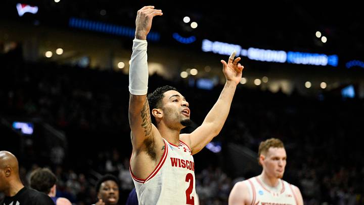 Mar 19, 2026; Portland, OR, USA; Wisconsin Badgers guard Nick Boyd (2) reacts during the second half of a first round game of the men's 2026 NCAA Tournament against the High Point Panthers at Moda Center. Mandatory Credit: Troy Wayrynen-Imagn Images