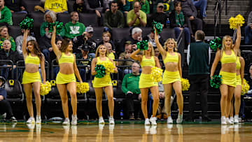The Oregon Ducks cheerleaders perform during the second half against the Illinois Fighting Illini.