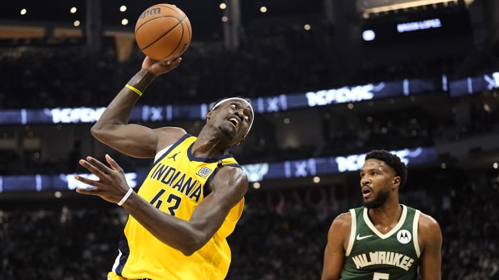 Apr 30, 2024; Milwaukee, Wisconsin, USA;  Indiana Pacers forward Pascal Siakam (43) reaches for a pass as Milwaukee Bucks guard Malik Beasley (5) looks on during the third quarter during game five of the first round for the 2024 NBA playoffs at Fiserv Forum. Mandatory Credit: Jeff Hanisch-USA TODAY Sports