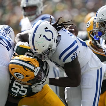 Sep 15, 2024; Green Bay, Wisconsin, USA;  Indianapolis Colts running back Jonathan Taylor (28) rushes with the football during the third quarter against the Green Bay Packers at Lambeau Field. Mandatory Credit: Jeff Hanisch-Imagn Images