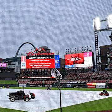 May 8, 2024; St. Louis, Missouri, USA;  A general view of the tarp on the field as storms move through the St. Louis region delaying a game between the St. Louis Cardinals and the New York Mets at Busch Stadium. Mandatory Credit: Jeff Curry-Imagn Images