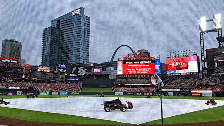 May 8, 2024; St. Louis, Missouri, USA;  A general view of the tarp on the field as storms move through the St. Louis region delaying a game between the St. Louis Cardinals and the New York Mets at Busch Stadium. Mandatory Credit: Jeff Curry-Imagn Images