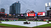 May 8, 2024; St. Louis, Missouri, USA;  A general view of the tarp on the field as storms move through the St. Louis region delaying a game between the St. Louis Cardinals and the New York Mets at Busch Stadium. Mandatory Credit: Jeff Curry-Imagn Images
