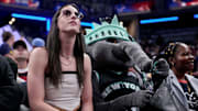 Caitlin Clark watched courtside for Friday’s All-Star weekend festivities instead of competing in her first three-point contest. 