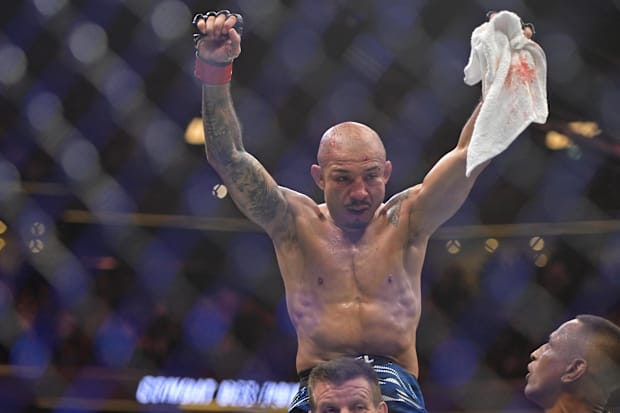Jose Aldo (red gloves) reacts after a fight with Aiemann Zahabi (not pictured) during UFC 315 at Bell Centre. 