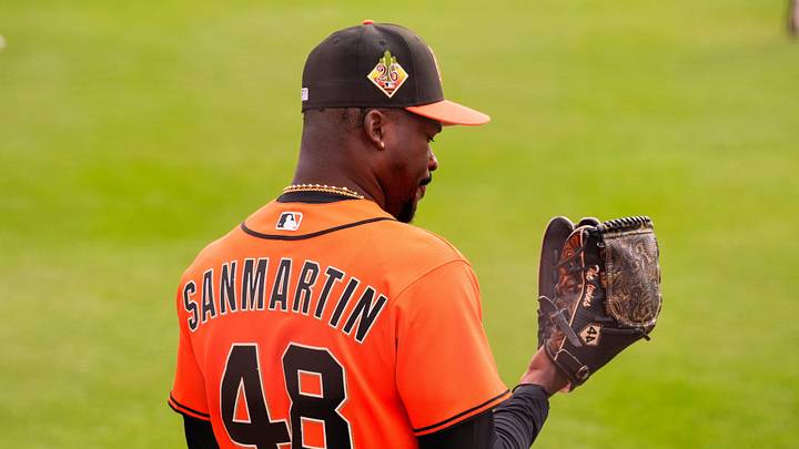 Feb 16, 2026; Scottsdale, AZ, USA; San Francisco Giants pitcher Reiver Sanmartin looks at his glove during workouts at Scottsdale Stadium in Scottsdale, Arizona.  Mandatory Credit: Arianna Grainey-Imagn Images
