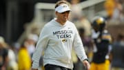 Sep 6, 2025; Columbia, Missouri, USA; Missouri Tigers head coach Eliah Drinkwitz during warmups prior to a game against the Kansas Jayhawks at Faurot Field at Memorial Stadium. Mandatory Credit: Jay Biggerstaff-Imagn Images