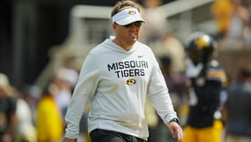 Missouri Tigers head coach Eliah Drinkwitz walks on the field, before a game against the Kansas Jayhawks this season.