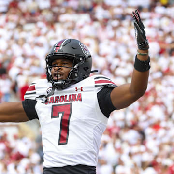 Oct 19, 2024; Norman, Oklahoma, USA;  South Carolina Gamecocks defensive back Nick Emmanwori (7) reacts after returning an interception for a touchdown during the first half against the Oklahoma Sooners at Gaylord Family-Oklahoma Memorial Stadium. Mandatory Credit: Kevin Jairaj-Imagn Images