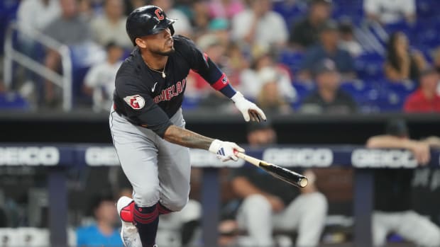 Gabriel Arias watches his home run leave the ballpark.