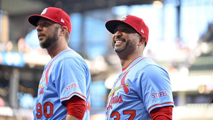 May 31, 2025; Arlington, Texas, USA; St. Louis Cardinals manager Oliver Marmol (37) and pitching coach Dusty Blake (90) look to the stands after the Cardinals defeat the Texas Rangers at Globe Life Field. Mandatory Credit: Jerome Miron-Imagn Images