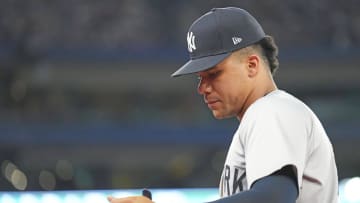 Jun 30, 2024; Toronto, Ontario, CAN; New York Yankees right fielder Juan Soto (22) walks towards the dugout against the Toronto Blue Jays at the end of the seventh inning at Rogers Centre. Mandatory Credit: Nick Turchiaro-USA TODAY Sports