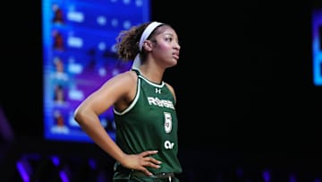 Jan 17, 2025; Miami, FL, USA; Angel Reese (5) of the Rose takes a moment against the Vinyl during a timeout in the first half of the Unrivaled women’s professional 3v3 basketball league at Wayfair Arena. Mandatory Credit: Jim Rassol-Imagn Images