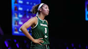 Jan 17, 2025; Miami, FL, USA; Angel Reese (5) of the Rose takes a moment against the Vinyl during a timeout in the first half of the Unrivaled women’s professional 3v3 basketball league at Wayfair Arena. Mandatory Credit: Jim Rassol-Imagn Images