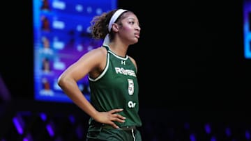 Jan 17, 2025; Miami, FL, USA; Angel Reese (5) of the Rose takes a moment against the Vinyl during a timeout in the first half of the Unrivaled women’s professional 3v3 basketball league at Wayfair Arena. Mandatory Credit: Jim Rassol-Imagn Images