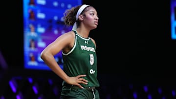 Reese of the Rose takes a moment against the Vinyl during a timeout in the first half of the Unrivaled women’s professional 3v3 basketball league at Wayfair Arena. 
