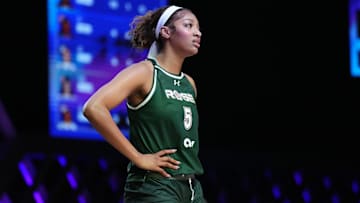 Jan 17, 2025; Miami, FL, USA; Angel Reese (5) of the Rose takes a moment against the Vinyl during a timeout in the first half of the Unrivaled women’s professional 3v3 basketball league at Wayfair Arena. Mandatory Credit: Jim Rassol-Imagn Images