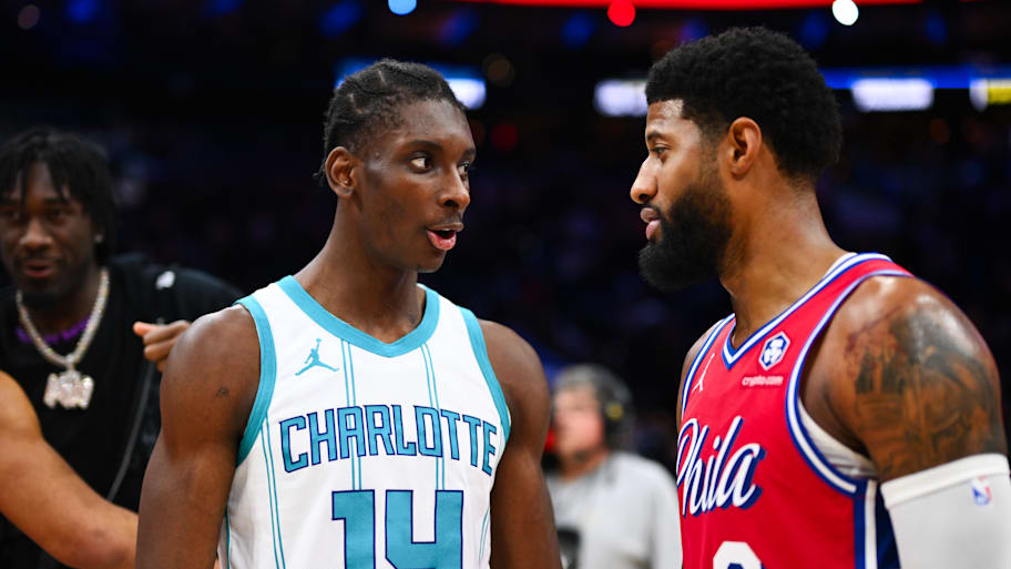 Hornets forward Moussa Diabate talks with Paul George after a game last season.  | Kyle Ross-Imagn Images