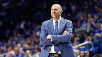 Feb 8, 2025; Lexington, Kentucky, USA; Kentucky Wildcats head coach Mark Pope smiles as he watches the action during the second half against the South Carolina Gamecocks at Rupp Arena at Central Bank Center. Mandatory Credit: Jordan Prather-Imagn Images