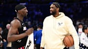 Mar 29, 2025; Philadelphia, Pennsylvania, USA; Miami Heat center Bam Adebayo (13) talks with Philadelphia 76ers center Joel Embiid after the game at Wells Fargo Center. Mandatory Credit: Kyle Ross-Imagn Images
