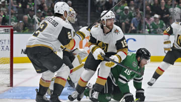 May 5, 2024; Dallas, Texas, USA; Vegas Golden Knights defenseman Noah Hanifin (15) takes down Dallas Stars center Joe Pavelski (16) in the Vegas zone during the second period in game seven of the first round of the 2024 Stanley Cup Playoffs at American Airlines Center. Mandatory Credit: Jerome Miron-USA TODAY Sports