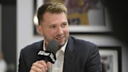 Los Angeles Lakers guard Luka Doncic is interviewed by Spectrum SportsNet following a press conference.