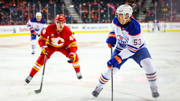 Sep 23, 2024; Calgary, Alberta, CAN; Edmonton Oilers center Jeff Skinner (53) controls the puck against the Calgary Flames during the first period at Scotiabank Saddledome. Mandatory Credit: Sergei Belski-Imagn Images